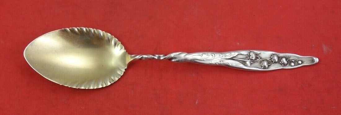 Whiting Sterling Silver Ice Cream Spoon Lily of the Valley Ruffled Twist 5 5/8": Whiting Sterling Silver Ice Cream Spoon Lily of the Valley Ruffled Twist 5 5/8" This exquisite ice cream spoon from the renowned Whiting brand is crafted from sterling silver and features the elegant