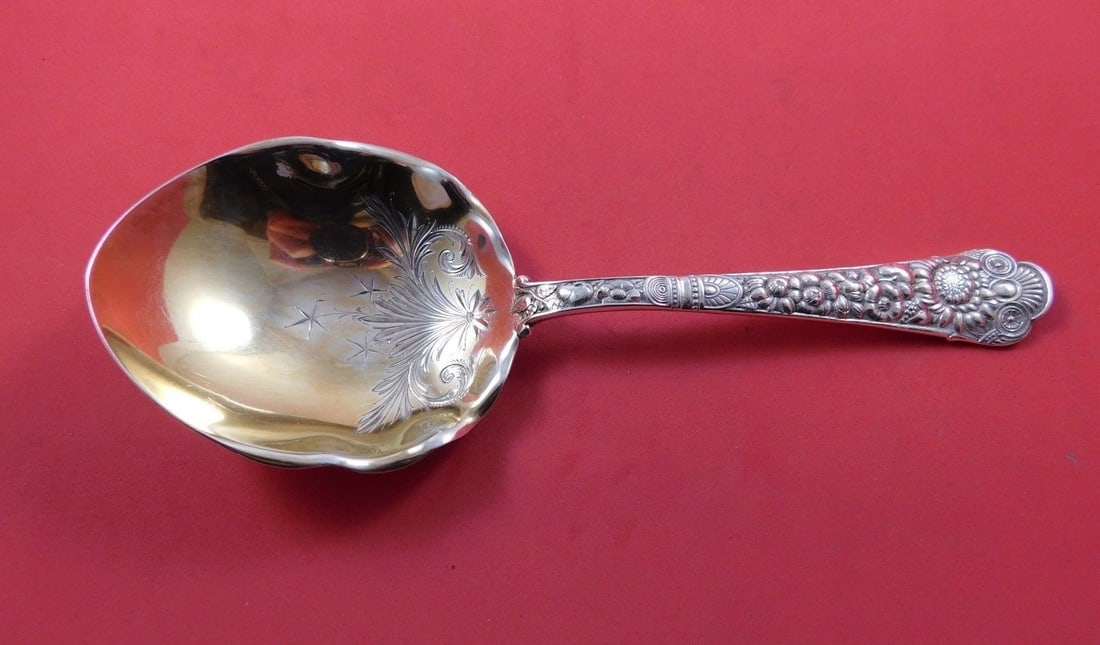 Gorham Cluny Sterling Silver Gold Washed Berry Spoon 8.5 inch: Gorham Cluny Sterling Silver Gold Washed Berry Spoon 8.5 inch This exquisite Cluny pattern berry spoon by Gorham is crafted from sterling silver and features a stunning gold wash with bright-cut detai