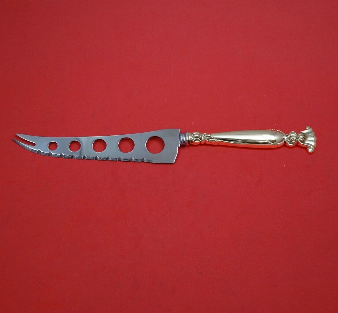 Wallace Romance of the Sea Sterling Silver Charcuterie Knife 9 3/4": Wallace Romance of the Sea Sterling Silver Charcuterie Knife 9 3/4" Elevate your entertaining with this exquisite large charcuterie knife from the Romance of the Sea pattern by Wallace. Crafted in ste