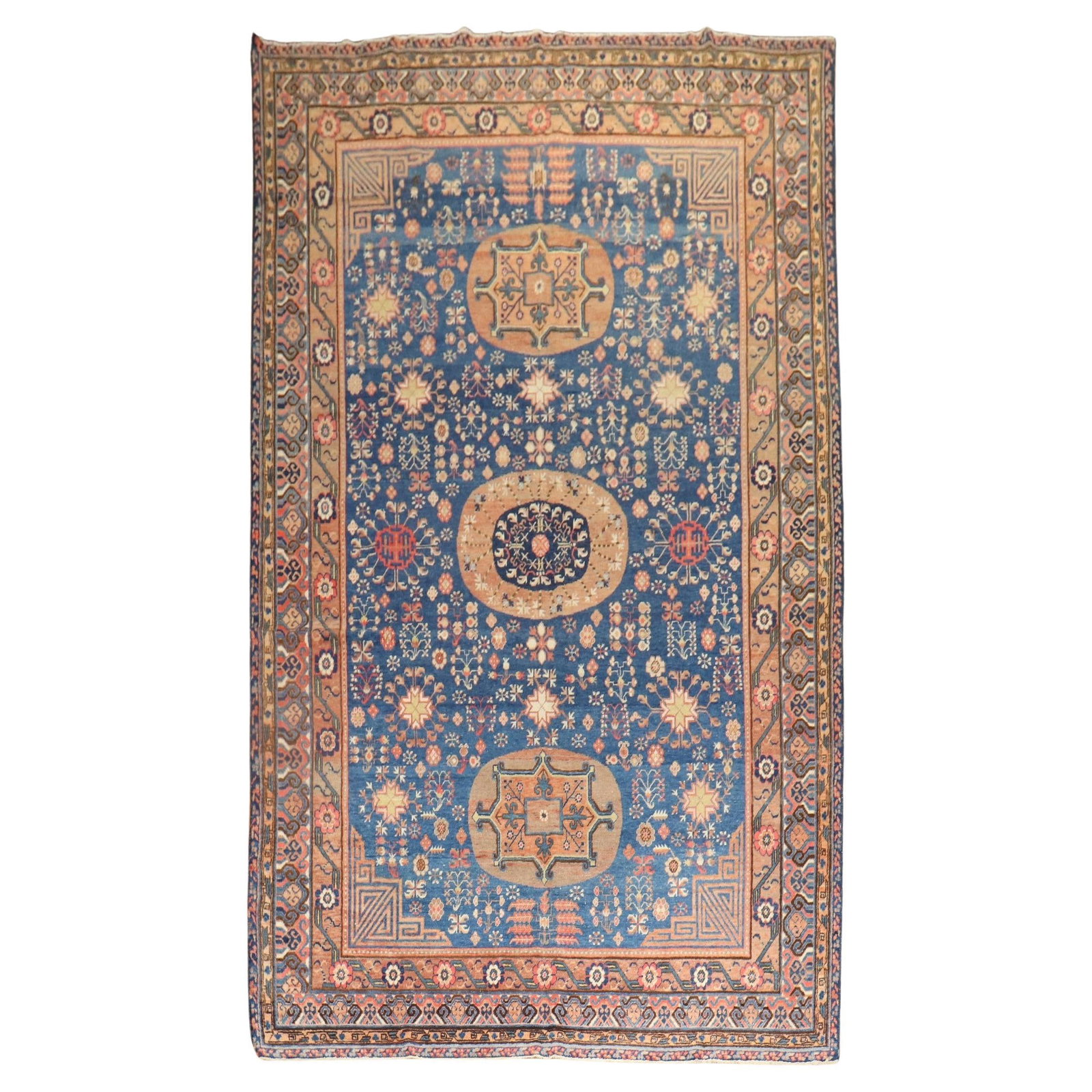 Early 20th Century Blue Khotan Gallery Wool Rug East Turkestan 6'10 x 13'2: Early 20th Century Blue Khotan Gallery Wool Rug East Turkestan 6'10 x 13'2 This early 20th century Samarkand Khotan rug features a rich blue color and bohemian style. Hand-woven from wool, this antiqu