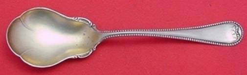 Lunt Priscilla Sterling Silver Gold-Washed Sugar Spoon 6": Lunt Priscilla Sterling Silver Gold-Washed Sugar Spoon 6" This exquisite 6-inch sugar spoon is crafted from sterling silver and features a beautiful gold wash. Designed in the elegant Priscilla patter
