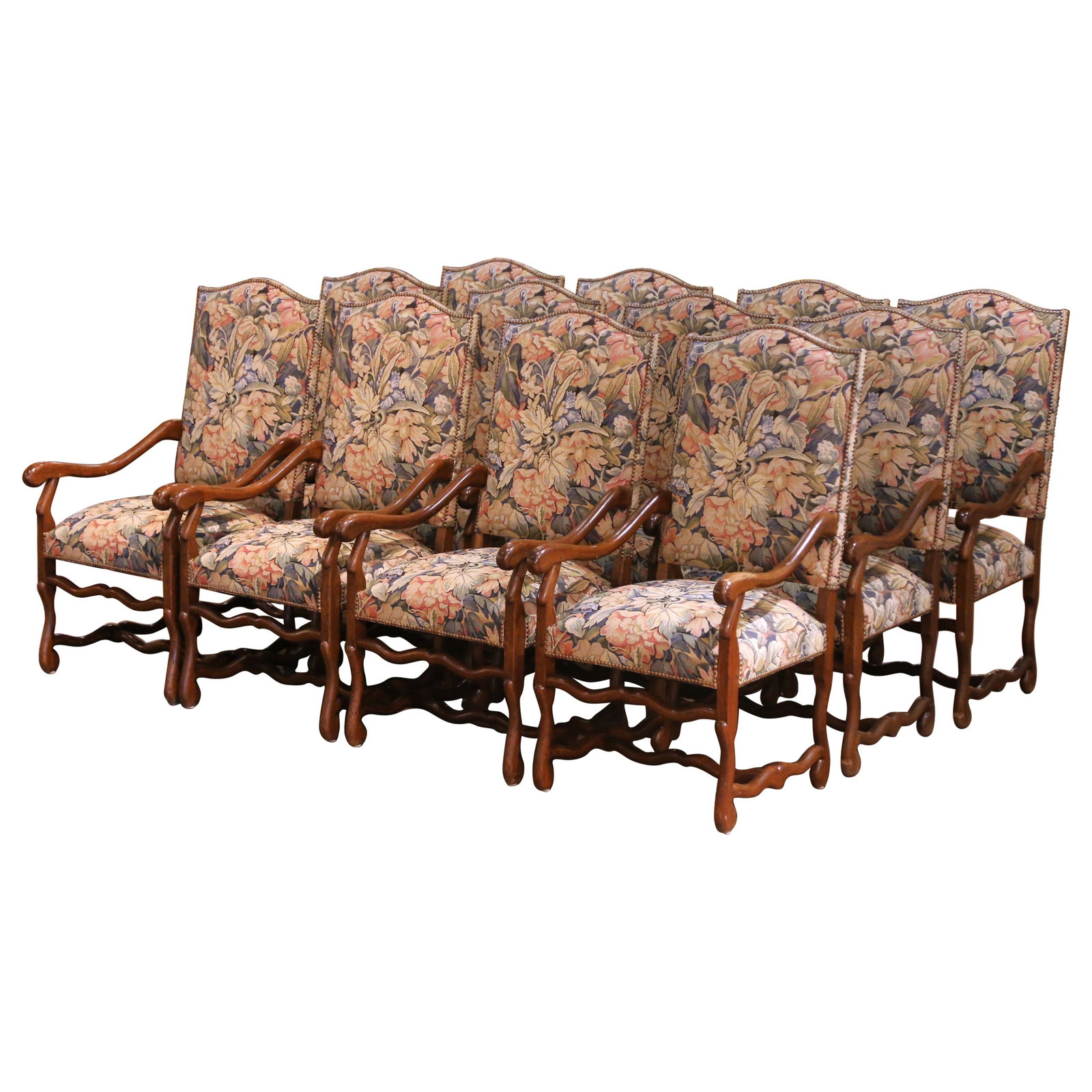 Set of 12 Oak Louis XIII Style Dining Armchairs with Tapestry Seats: Set of 12 Oak Louis XIII Style Dining Armchairs with Tapestry Seats This set of twelve Louis XIII style dining armchairs was crafted circa 1980 in France. Each chair features a hand-carved solid oak f