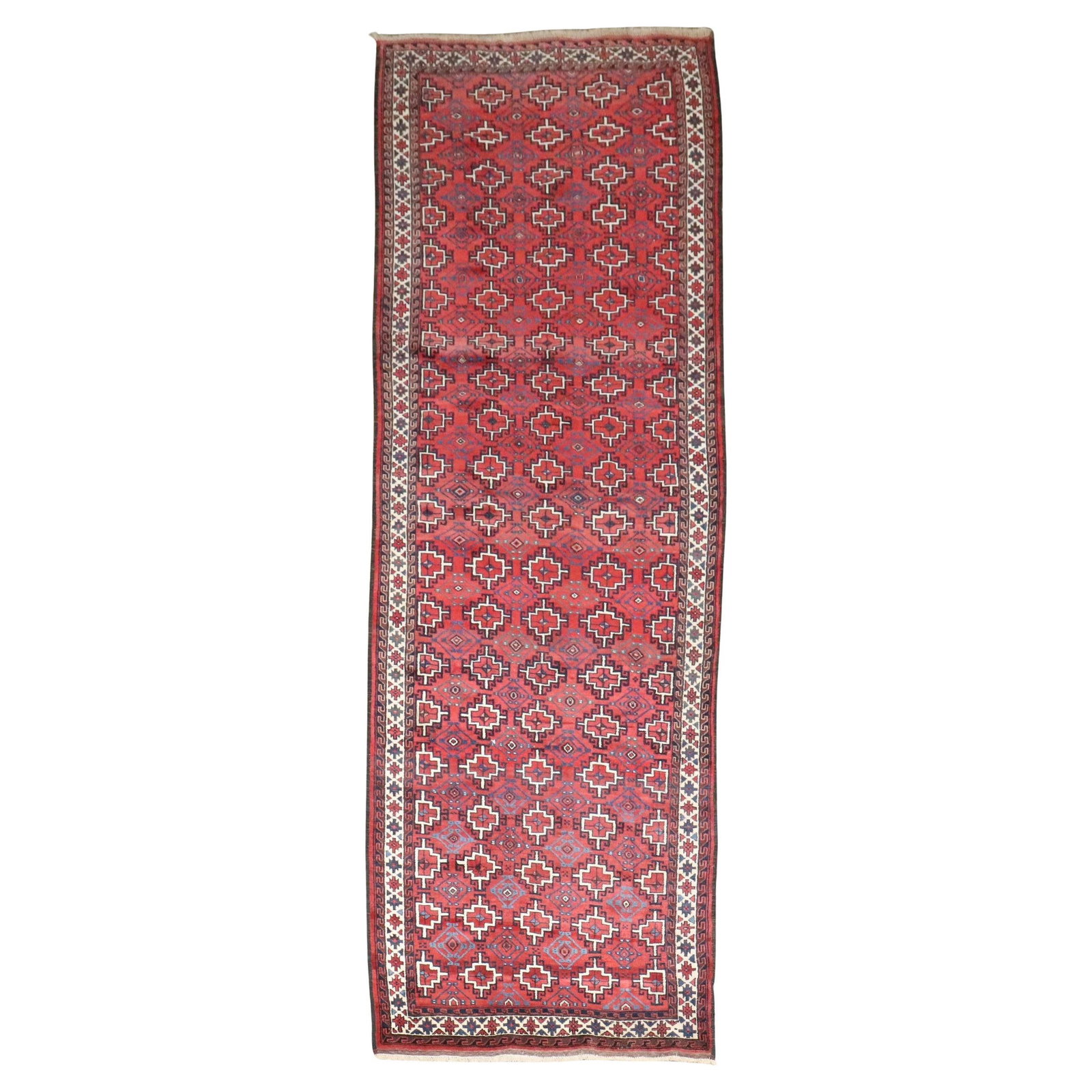 Early 20th Century Tribal Turkmenistan Wool Runner Rug 3'7 x 10'7: Early 20th Century Tribal Turkmenistan Wool Runner Rug 3'7 x 10'7 This rare antique Turkoman runner from the early 20th century features a distinctive tribal style. Expertly hand-woven from wool, it