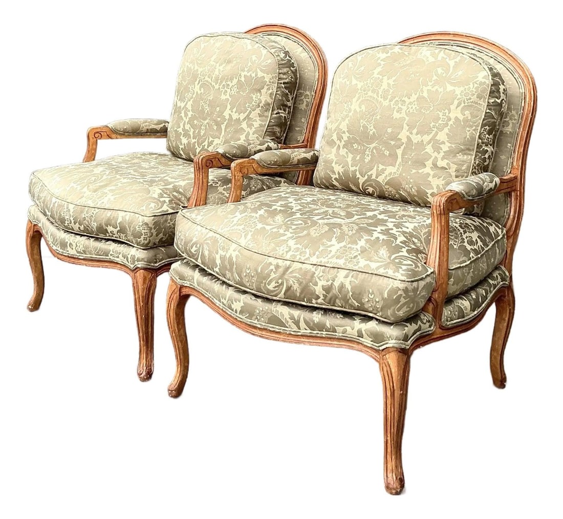 Pair of Louis XVI Style Carved Jacquard Upholstered Fauteuil Chairs: Pair of Louis XVI Style Carved Jacquard Upholstered Fauteuil Chairs This pair of vintage Regency-style fauteuil chairs embodies the refined elegance of the Louis XVI tradition, featuring intricately c
