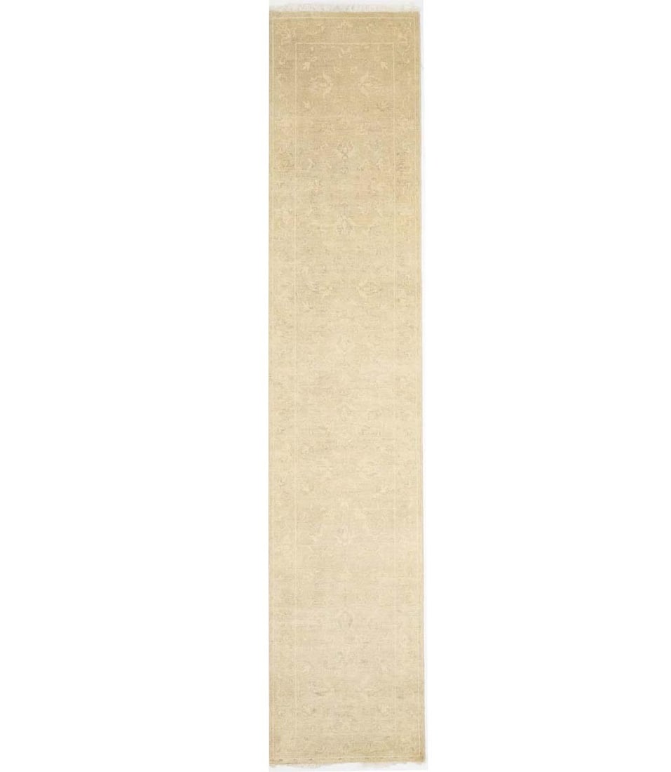 Hand-Knotted Wool Runner Rug 2'6 x 11'9 Transitional Floral Pattern: Hand-Knotted Wool Runner Rug 2'6 x 11'9 Transitional Floral Pattern This handmade transitional oriental runner rug features a muted floral pattern in shades of beige, cream, and taupe. Crafted from ha