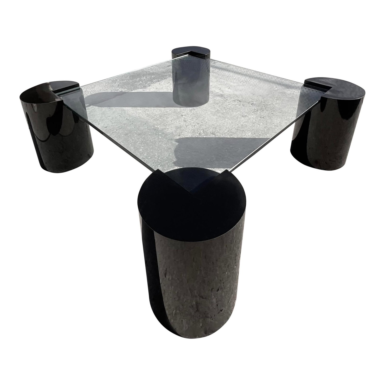 Vintage 80s Glamorous Coffee Table with Black Pedestals and Glass Top: Vintage 80s Glamorous Coffee Table with Black Pedestals and Glass Top Discover the striking Vintage 80s Four Corners Pedestal Coffee Table, a remarkable statement piece reminiscent of the designs by K
