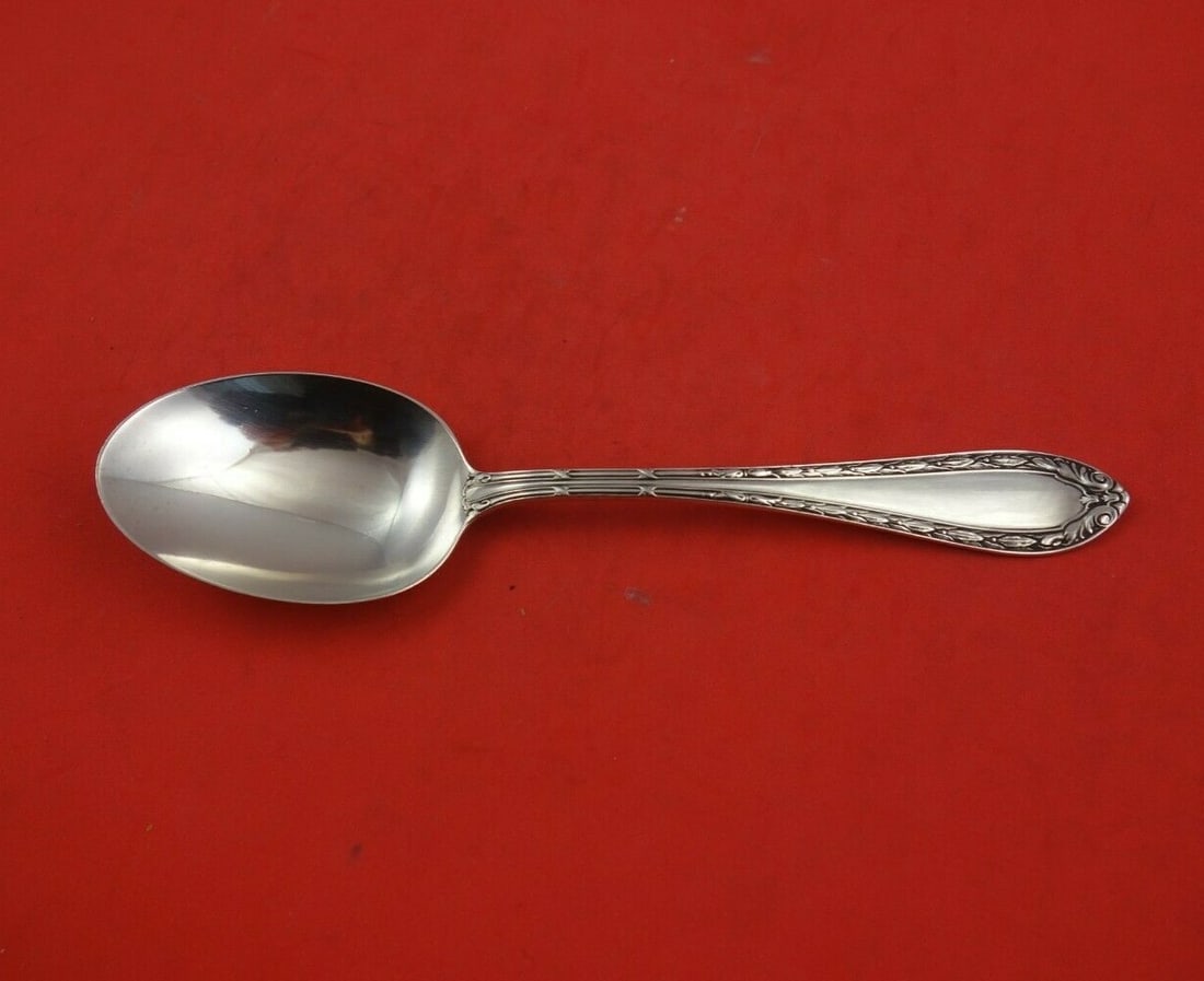 Dominick & Haff Louis XVI Sterling Silver Preserve Spoon 7 3/8": Dominick & Haff Louis XVI Sterling Silver Preserve Spoon 7 3/8" This exquisite serving spoon features the classic Louis XVI pattern by Dominick & Haff. Crafted from high-quality sterling silver, this