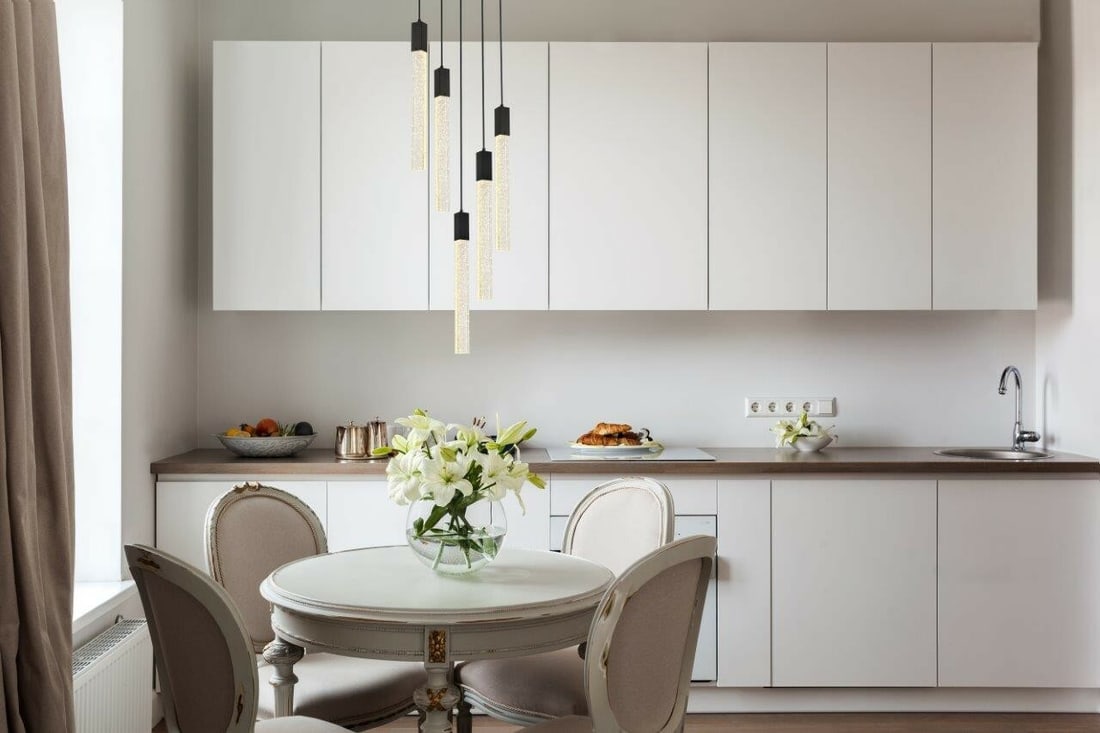 Weston Modern Five-Light Pendant Chandelier With Black Finish and Crystal Glass Shades: Weston Modern Five-Light Pendant Chandelier With Black Finish and Crystal Glass Shades This modern pendant chandelier features five clear seeded crystal bar glass shades with a black finish, providing