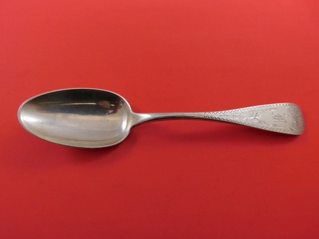 Sterling Silver Serving Spoon Bright-Cut Design 8.5 Inches: Sterling Silver Serving Spoon Bright-Cut Design 8.5 Inches This exquisite serving spoon is crafted from high-quality sterling silver and features a beautiful bright-cut design by various makers. Measu