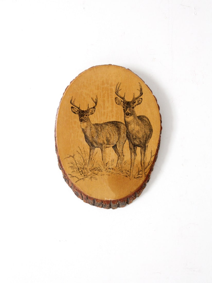 Barry Wehr Vintage Deer Art on Natural Wood Slab: Barry Wehr Vintage Deer Art on Natural Wood Slab This vintage wall art features a beautifully detailed drawing of two deer on a natural wood slab, signed by the artist Barry Wehr. The artwork showcase