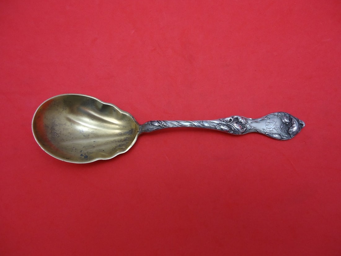 Reed & Barton Les Cinq Fleurs Sterling Goldwashed Preserve Spoon 7": Reed & Barton Les Cinq Fleurs Sterling Goldwashed Preserve Spoon 7" This exquisite Les Cinq Fleurs Preserve Spoon by Reed & Barton is crafted from sterling silver with a beautiful goldwash finish. Mea