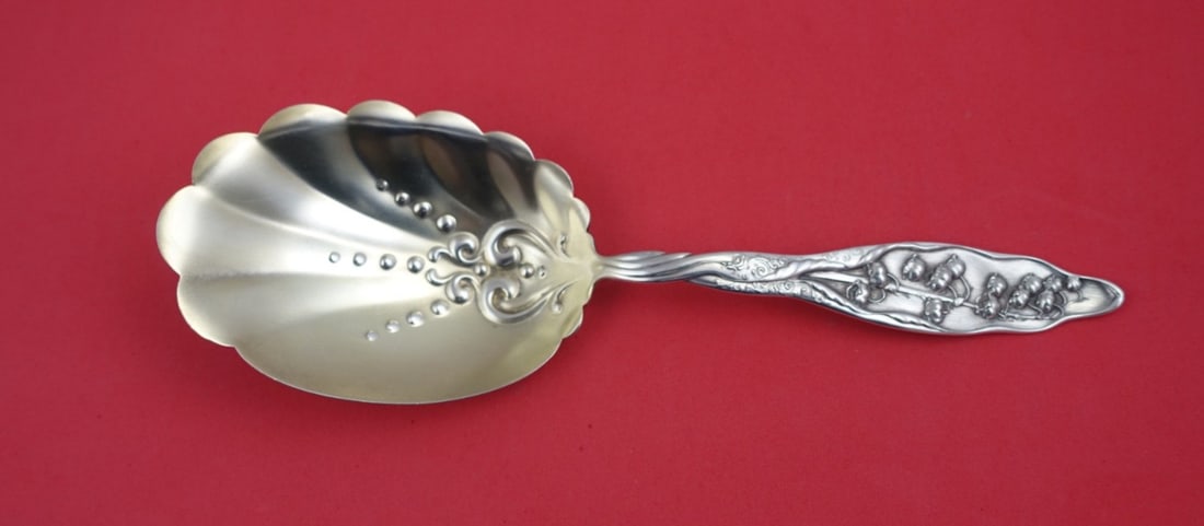 Whiting Sterling Silver Lily of the Valley Cracker Scoop 9.5" Gold Wash: Whiting Sterling Silver Lily of the Valley Cracker Scoop 9.5" Gold Wash This exquisite cracker scoop features the elegant 'Lily of the Valley' pattern by Whiting, crafted from sterling silver with a g