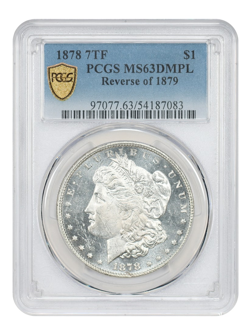 PCGS MS63DMPL 1878 Morgan Dollar 7 Tailfeathers Reverse of 1879: PCGS MS63DMPL 1878 Morgan Dollar 7 Tailfeathers Reverse of 1879 This is an 1878 Morgan Dollar featuring the 7 Tail Feathers reverse of 1879 variety. Graded MS63 Deep Mirror Prooflike (DMPL) by PCGS, t