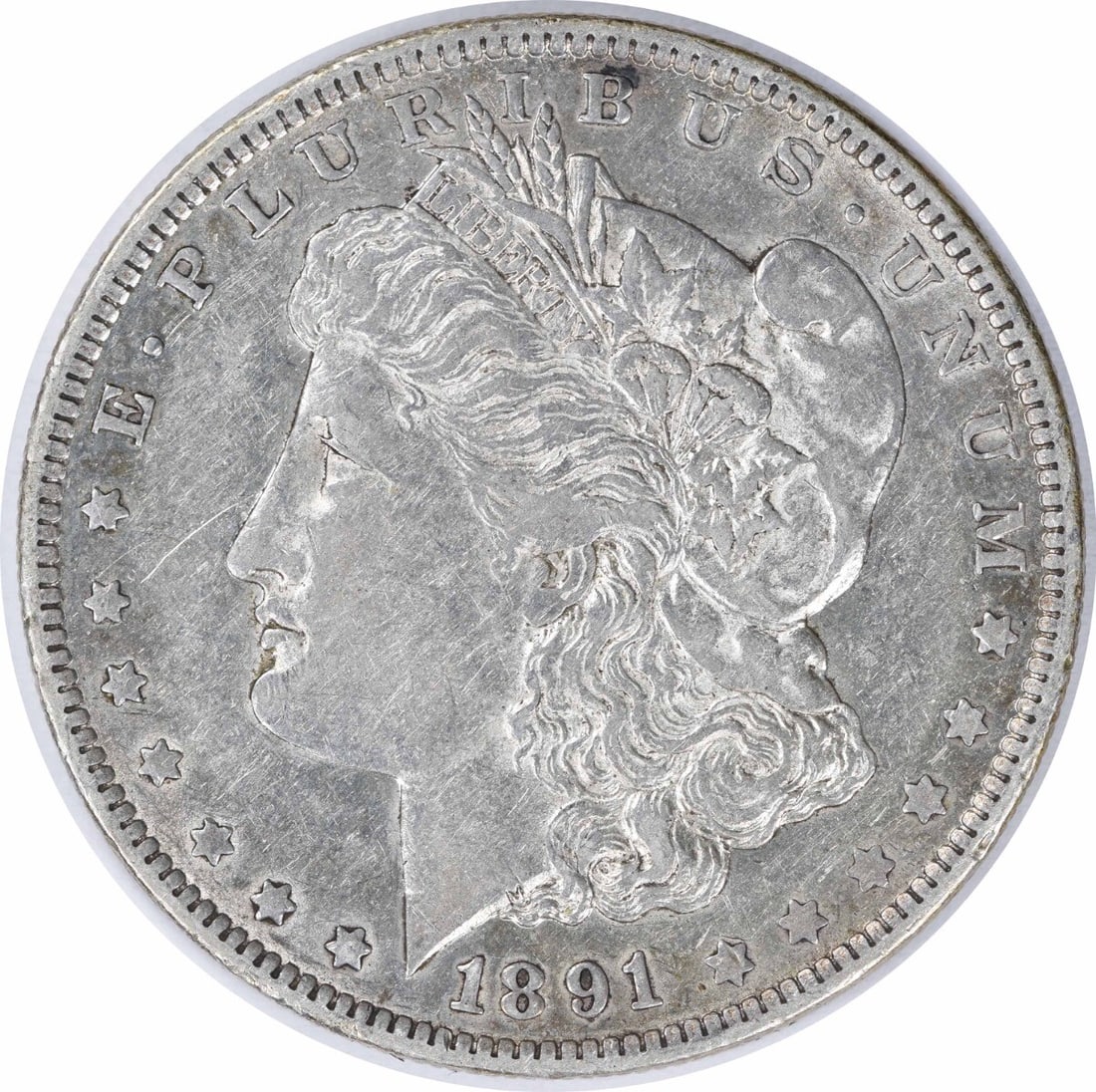 1891-O Morgan Silver Dollar XF Uncertified 90% Silver 10% Copper: 1891-O Morgan Silver Dollar XF Uncertified 90% Silver 10% Copper This 1891-O Morgan Silver Dollar is a remarkable piece of numismatic history. Struck in 90% silver and 10% copper, this coin showcases 