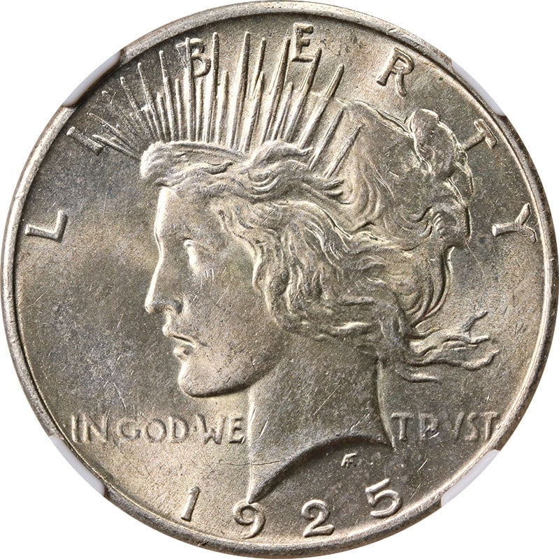 NGC MS63 1925 Peace Silver Dollar With Attractive Toning: NGC MS63 1925 Peace Silver Dollar With Attractive Toning This 1925-P Peace Dollar is certified by NGC with a grade of MS63, indicating it is in uncirculated condition. The coin features attractive ton