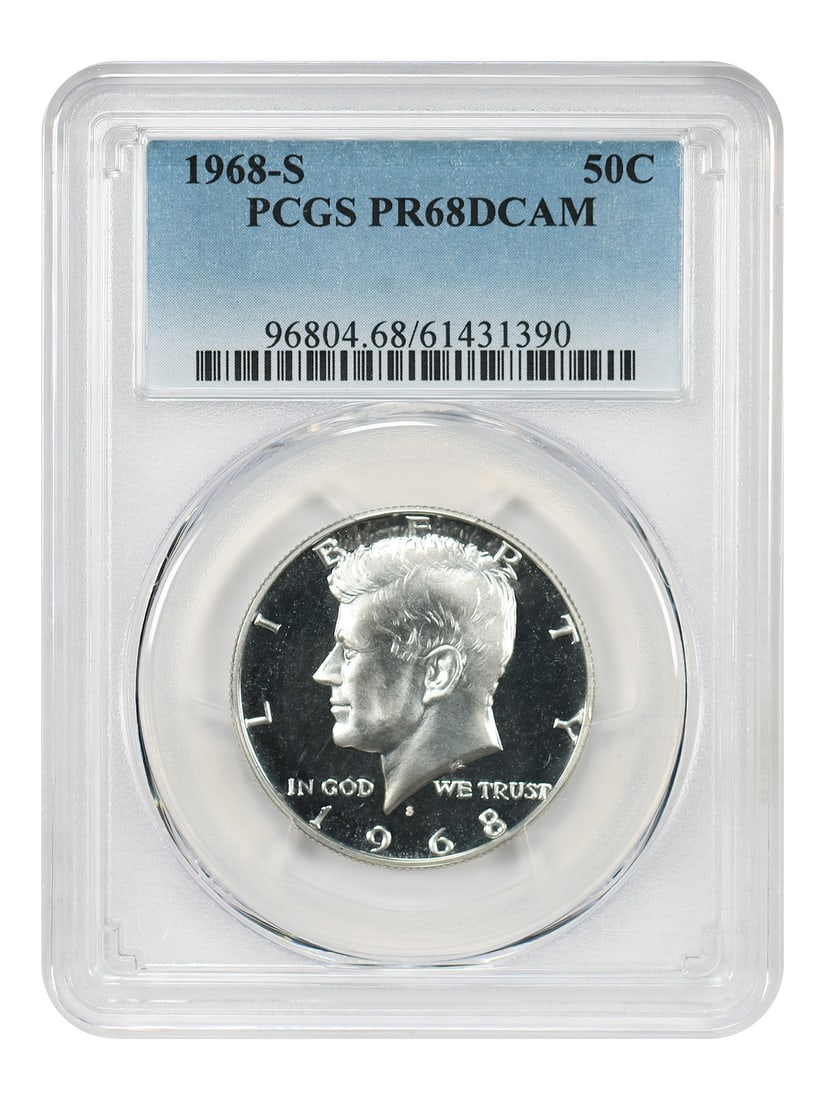 Kennedy Half Dollar 1968 San Francisco PCGS PR68DCAM: Kennedy Half Dollar 1968 San Francisco PCGS PR68DCAM This is a 1968-S Kennedy Half Dollar graded PR68 Deep Cameo (DCAM) by PCGS. The coin is uncirculated and was minted in San Francisco. It features a