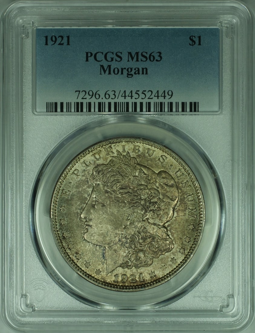 1921 $1 Silver Morgan Dollar PCGS MS63 Philadelphia With Toning: 1921 $1 Silver Morgan Dollar PCGS MS63 Philadelphia With Toning This is a 1921 Morgan Silver Dollar coin graded MS-63 by PCGS. The coin is uncirculated and features natural toning. It was minted in Ph