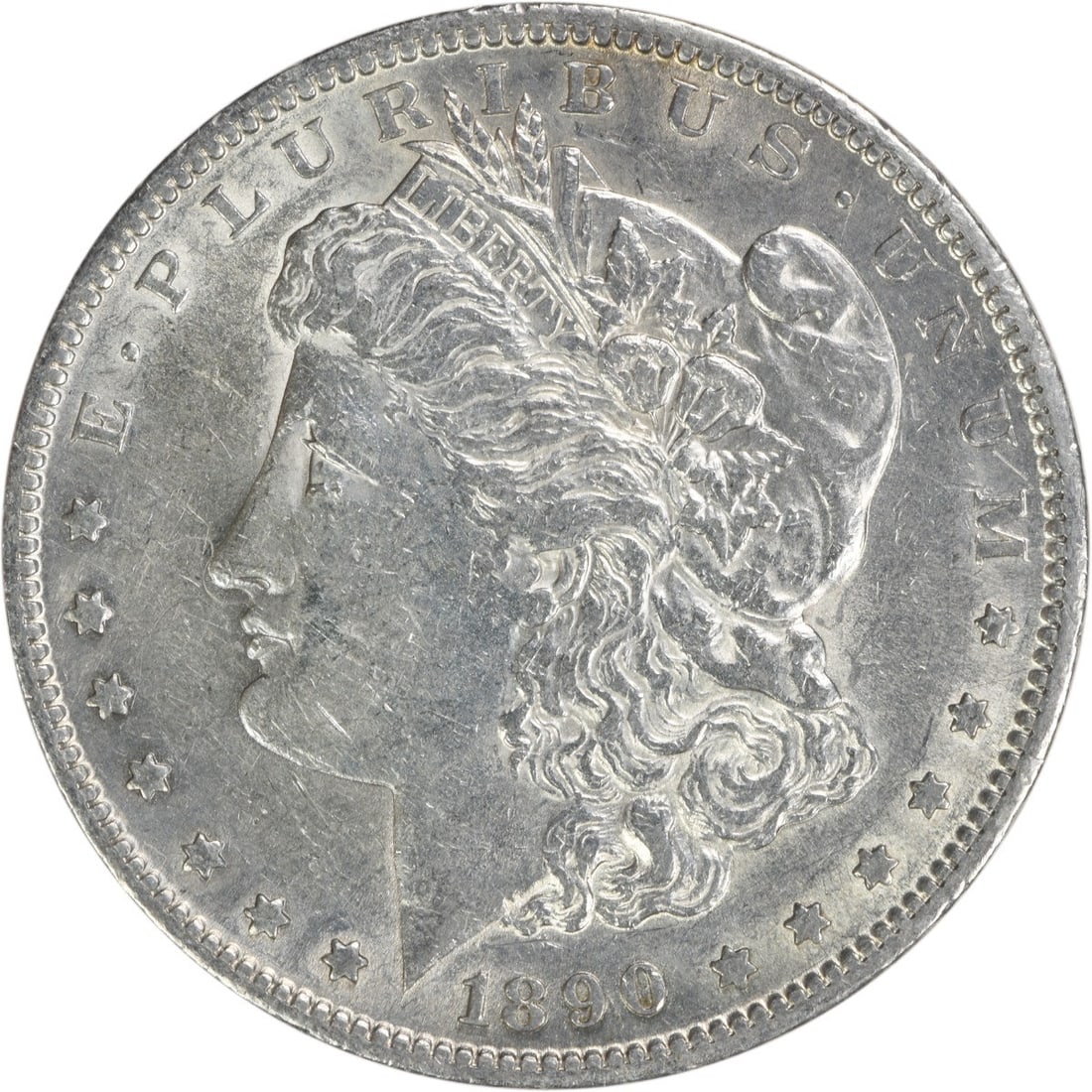 1890-S Morgan Silver Dollar AU Uncertified San Francisco Mint: 1890-S Morgan Silver Dollar AU Uncertified San Francisco Mint This 1890-S Morgan Silver Dollar is a remarkable piece of numismatic history, showcasing the artistry of designer George T. Morgan. It is 