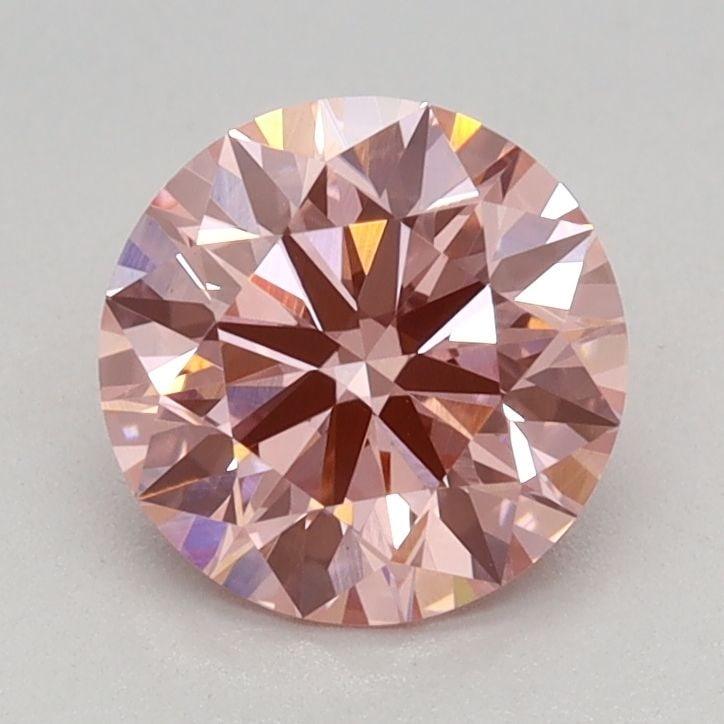 Ideal Loose Diamond - ROUND 0.93ct Fancy Vivid Pink VVS2: Ideal Loose Diamond - ROUND 0.93ct Fancy Vivid Pink VVS2 Source: This is a real non-mined Diamond that has been grown in a lab Shape: ROUND Carats: 0.93 Color: Fancy Vivid Pink Certification: IGI Vide