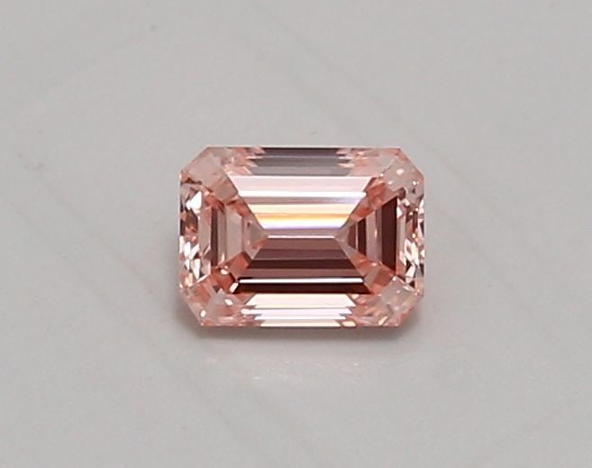 Loose Diamond - EMERALD 0.52ct Fancy Vivid Pink VVS2: Loose Diamond - EMERALD 0.52ct Fancy Vivid Pink VVS2 Source: This is a real non-mined Diamond that has been grown in a lab Shape: EMERALD Carats: 0.52 Color: Fancy Vivid Pink Certification: IGI Video: