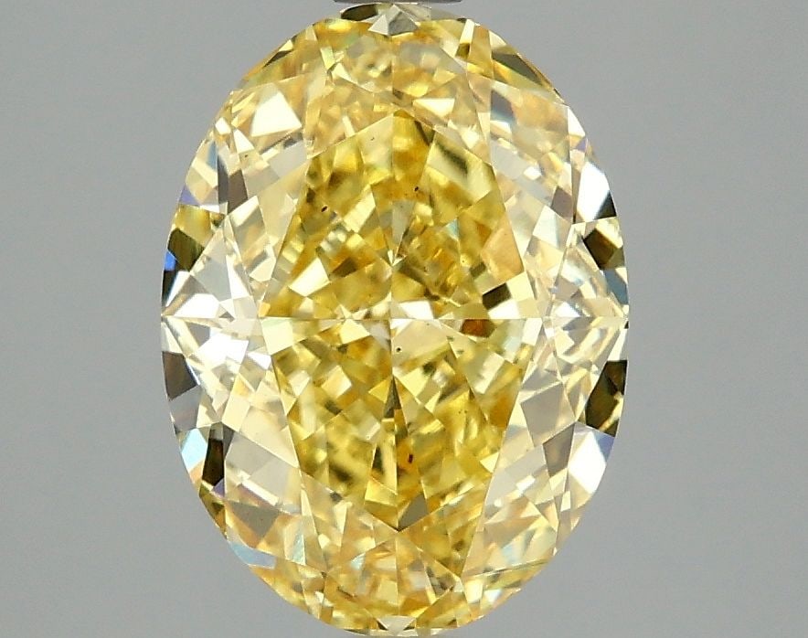 Loose Diamond - OVAL 3.09ct Fancy Vivid Yellow VS1: Loose Diamond - OVAL 3.09ct Fancy Vivid Yellow VS1 Source: This is a real non-mined Diamond that has been grown in a lab Shape: OVAL Carats: 3.09 Color: Fancy Vivid Yellow Certification: IGI Video: