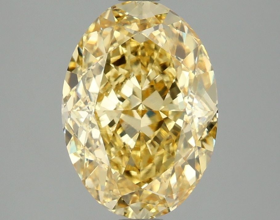Loose Diamond - OVAL 3.1ct Fancy Vivid Yellow VS1: Loose Diamond - OVAL 3.1ct Fancy Vivid Yellow VS1 Source: This is a real non-mined Diamond that has been grown in a lab Shape: OVAL Carats: 3.1 Color: Fancy Vivid Yellow Certification: IGI Video:
