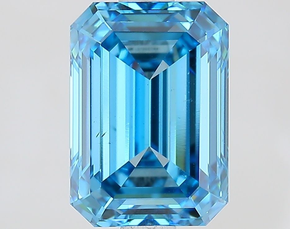 Loose Diamond - EMERALD 2.3ct Fancy Vivid Blue VS1: Loose Diamond - EMERALD 2.3ct Fancy Vivid Blue VS1 Source: This is a real non-mined Diamond that has been grown in a lab Shape: EMERALD Carats: 2.3 Color: Fancy Vivid Blue Certification: IGI Video: