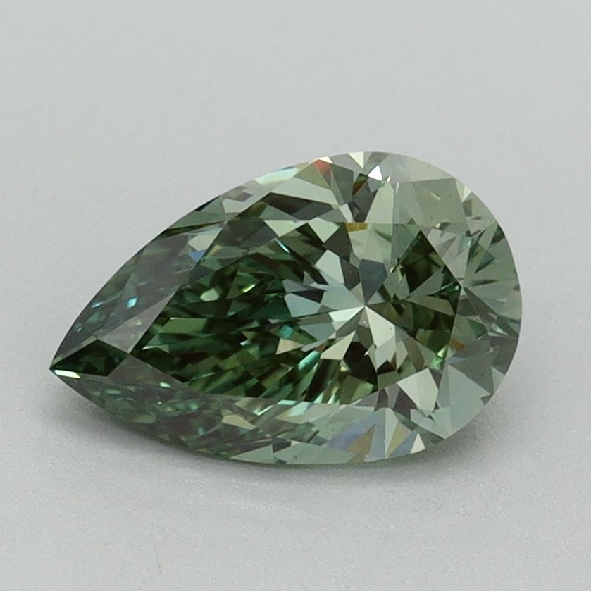 Loose Diamond - PEAR 1.12ct Fancy Vivid Green VS1: Loose Diamond - PEAR 1.12ct Fancy Vivid Green VS1 Source: This is a real non-mined Diamond that has been grown in a lab Shape: PEAR Carats: 1.12 Color: Fancy Vivid Green Certification: IGI Video: