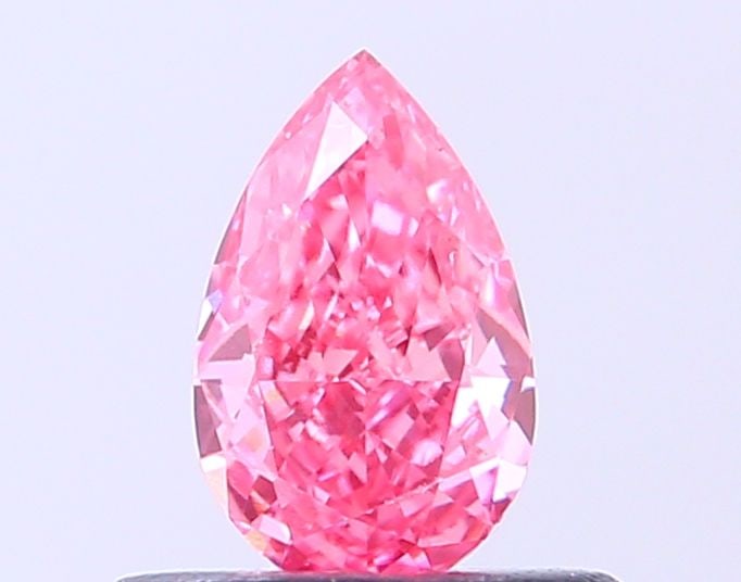 Loose Diamond - PEAR 0.36ct Fancy Vivid Pink VS2: Loose Diamond - PEAR 0.36ct Fancy Vivid Pink VS2 Source: This is a real non-mined Diamond that has been grown in a lab Shape: PEAR Carats: 0.36 Color: Fancy Vivid Pink Certification: IGI Video: Video