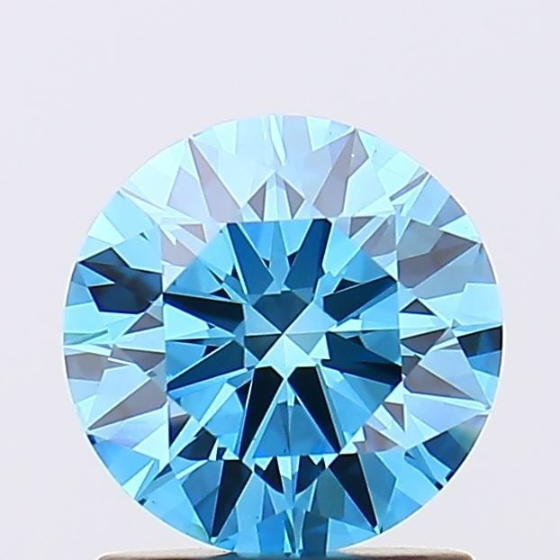 Ideal Loose Diamond - ROUND 1.26ct Fancy Vivid Blue VS1: Ideal Loose Diamond - ROUND 1.26ct Fancy Vivid Blue VS1 Source: This is a real non-mined Diamond that has been grown in a lab Shape: ROUND Carats: 1.26 Color: Fancy Vivid Blue Certification: IGI Video