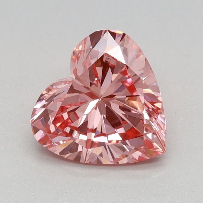 Loose Diamond - HEART 0.79ct Fancy Vivid Pink VVS2: Loose Diamond - HEART 0.79ct Fancy Vivid Pink VVS2 Source: This is a real non-mined Diamond that has been grown in a lab Shape: HEART Carats: 0.79 Color: Fancy Vivid Pink Certification: IGI Video: