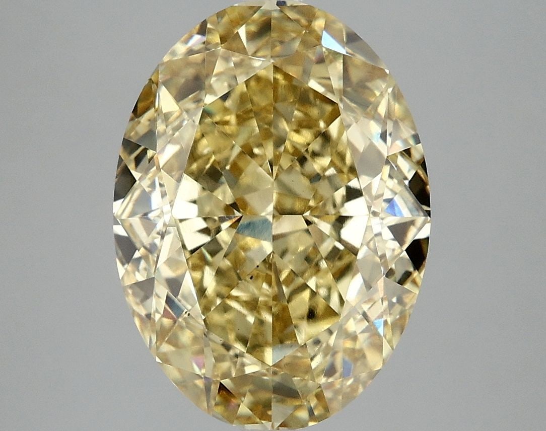Loose Diamond - OVAL 6.09ct Fancy Intense Yellow VS2: Loose Diamond - OVAL 6.09ct Fancy Intense Yellow VS2 Source: This is a real non-mined Diamond that has been grown in a lab Shape: OVAL Carats: 6.09 Color: Fancy Intense Yellow Certification: IGI Video