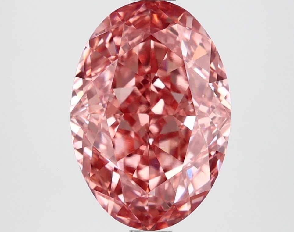 Loose Diamond - OVAL 2.87ct Fancy Vivid Pink VVS2: Loose Diamond - OVAL 2.87ct Fancy Vivid Pink VVS2 Source: This is a real non-mined Diamond that has been grown in a lab Shape: OVAL Carats: 2.87 Color: Fancy Vivid Pink Certification: IGI Video: