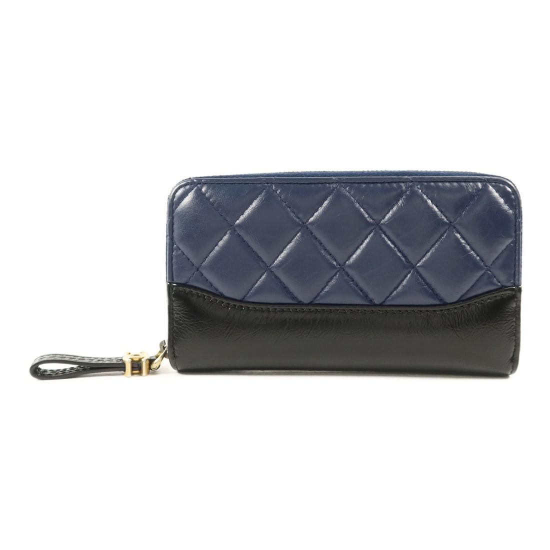 Chanel Gabrielle Round Wallet Navy Calfskin Leather with Gold Hardware: Chanel Gabrielle Round Wallet Navy Calfskin Leather with Gold Hardware This CHANEL Gabrielle round wallet is crafted from navy calfskin leather and features the iconic CC logo with gold-tone hardware.