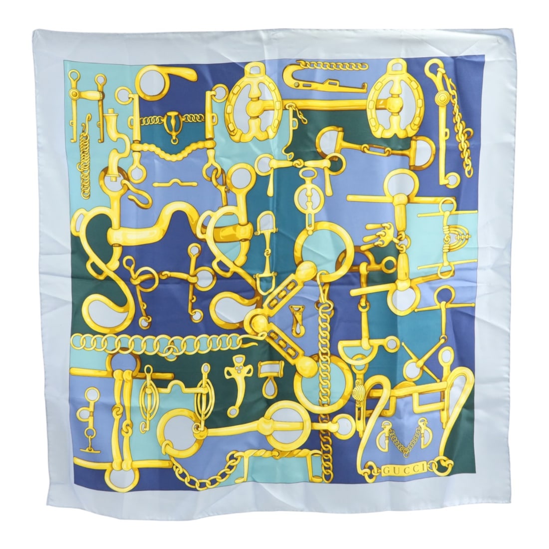 Gucci Silk Scarf Blue and Gold Square 65x65cm Women's Accessory: Gucci Silk Scarf Blue and Gold Square 65x65cm Women's Accessory This GUCCI scarf features a blue and gold color palette and is crafted from luxurious silk. Designed for women, it offers a classic and 
