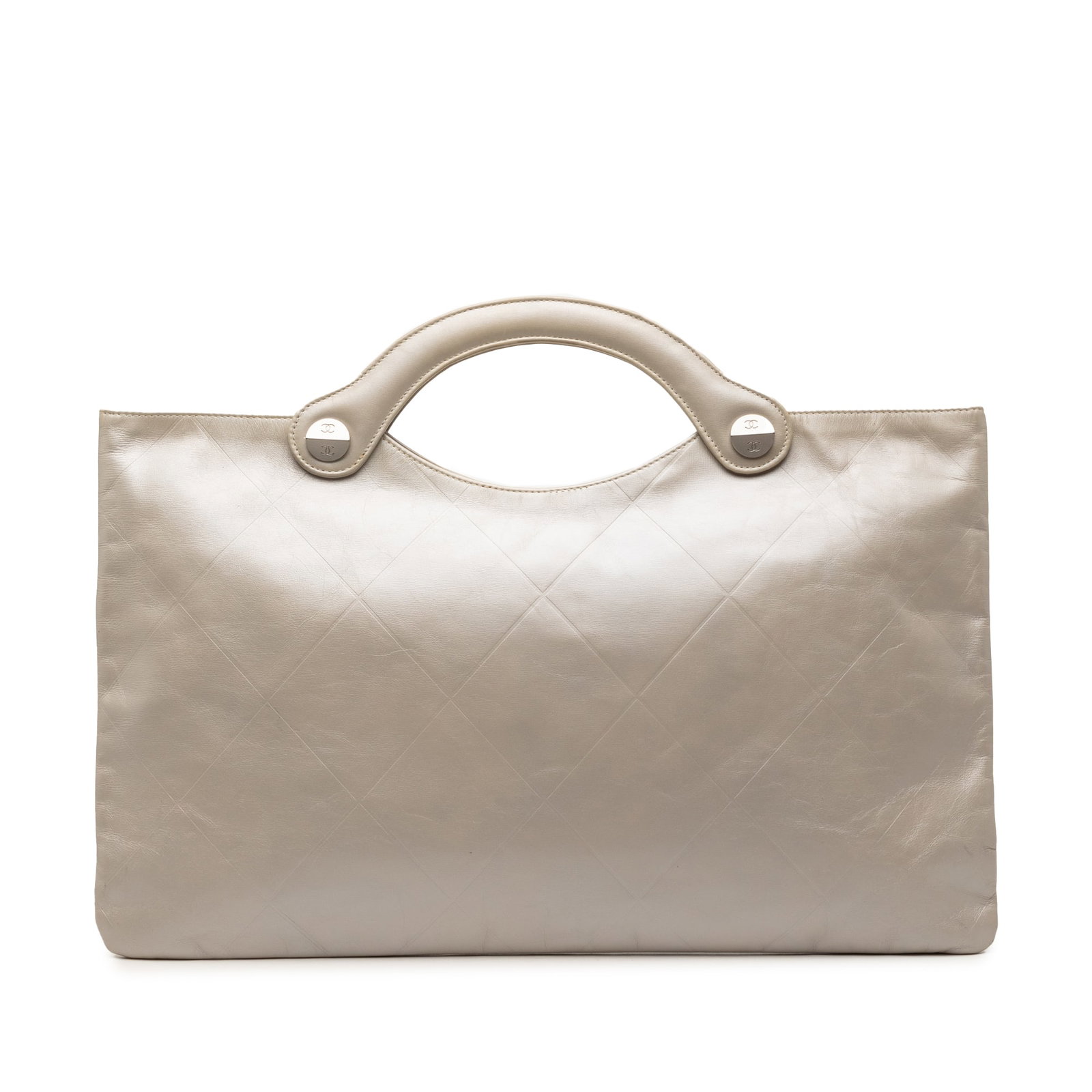 Chanel Gold Leather Embossed Calfskin Flat Tote Bag France: Chanel Gold Leather Embossed Calfskin Flat Tote Bag France This Chanel Metallic Embossed Calfskin Flat Handbag features a gold-tone leather body with structured handles, an open top, and an interior z
