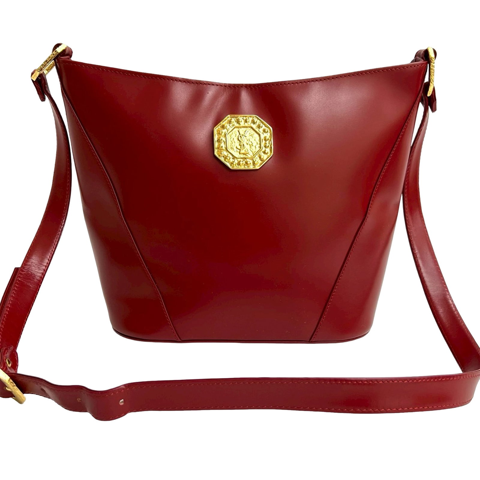 Red Leather Crossbody Bag by Saint Laurent with Adjustable Strap: Red Leather Crossbody Bag by Saint Laurent with Adjustable Strap This Saint Laurent crossbody bag is crafted from red leather and features an adjustable flat leather strap, a top zip closure, and an i