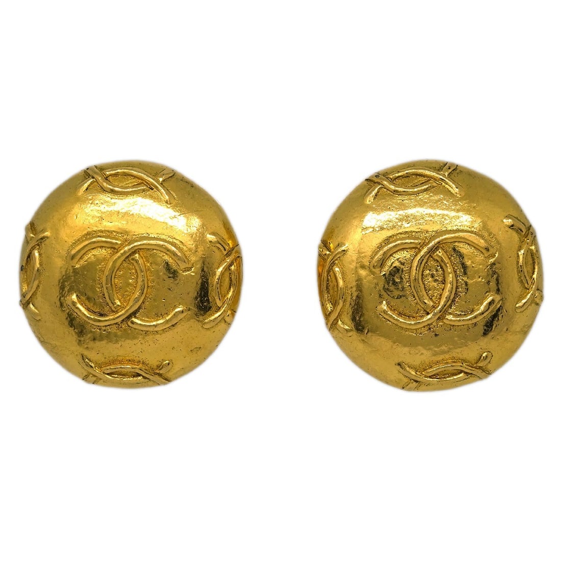 Chanel Gold-Plated Round Button Clip-On Earrings: Chanel Gold-Plated Round Button Clip-On Earrings Elevate your accessory collection with these stunning Chanel Button Earrings. Crafted in a chic round shape, these clip-on earrings feature a luxurious
