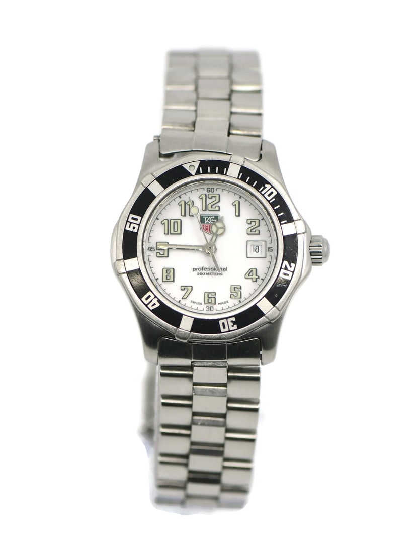 Women's Stainless Steel Quartz Wristwatch Tag Heuer Professional WM1311: Women's Stainless Steel Quartz Wristwatch Tag Heuer Professional WM1311 The Tag Heuer Professional WM1311 is a women's wristwatch featuring a round silver stainless steel case and matching bracelet. T