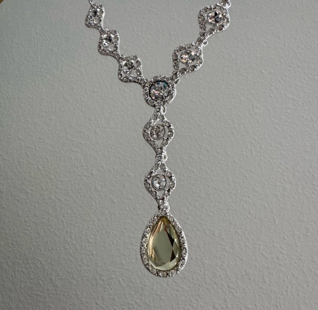 Charter Club Crystal Y-Necklace Silver Pale Yellow Pendant: Charter Club Crystal Y-Necklace Silver Pale Yellow Pendant Elevate your style with this stunning Charter Club Crystal Y-Necklace. This exquisite piece showcases a blend of round and pear-cut crystals 