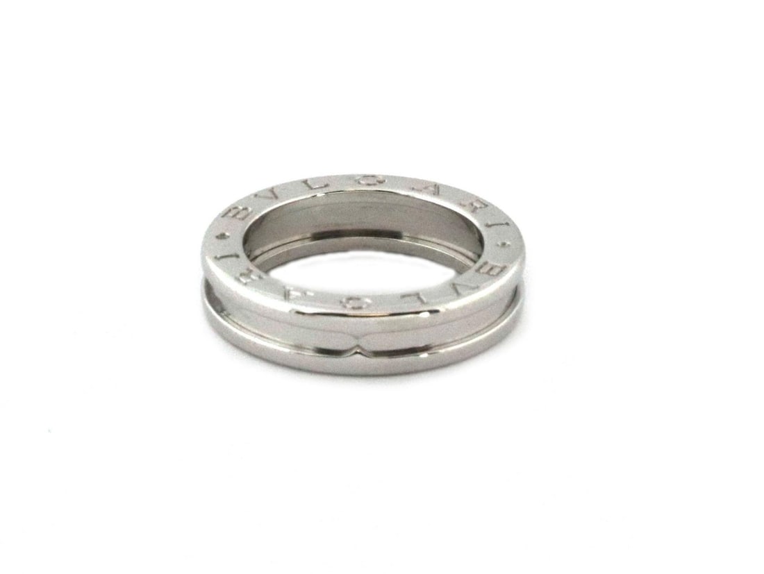 Bvlgari B Zero 1 18k Gold Band Ring EU 49 US 5: Bvlgari B Zero 1 18k Gold Band Ring EU 49 US 5 This exquisite band ring is an authentic piece from Bvlgari's renowned B Zero 1 collection. Crafted from a luxurious combination of 18k white and yellow 