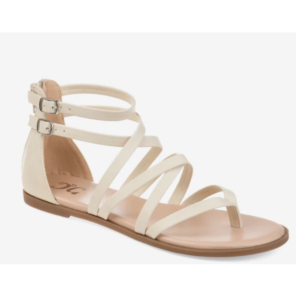 Journee Collection Zailie Ivory Gladiator Flat Sandals 9.5: Journee Collection Zailie Ivory Gladiator Flat Sandals 9.5 Step into style with the Zailie Criss Cross Strap Flat Sandals in Ivory by Journee Collection. These sandals feature a chic gladiator-inspire