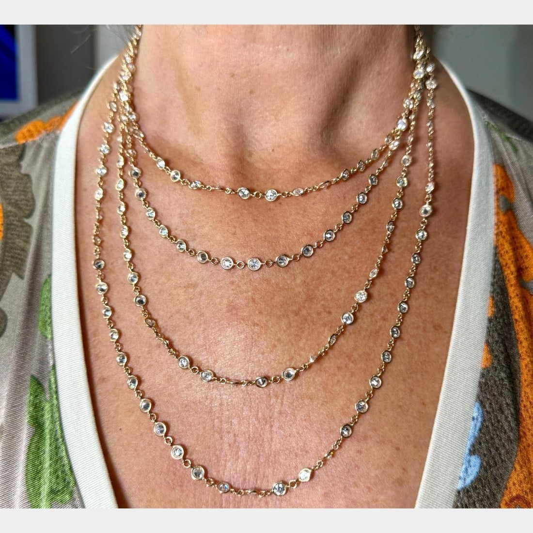 77 Inch 18K Rose Gold Diamond by the Yard Necklace 39.85 Carats: 77 Inch 18K Rose Gold Diamond by the Yard Necklace 39.85 Carats This 18K rose gold necklace features a diamond by the yard design, set with approximately 200 diamonds totaling 39.85 carats. The diamon