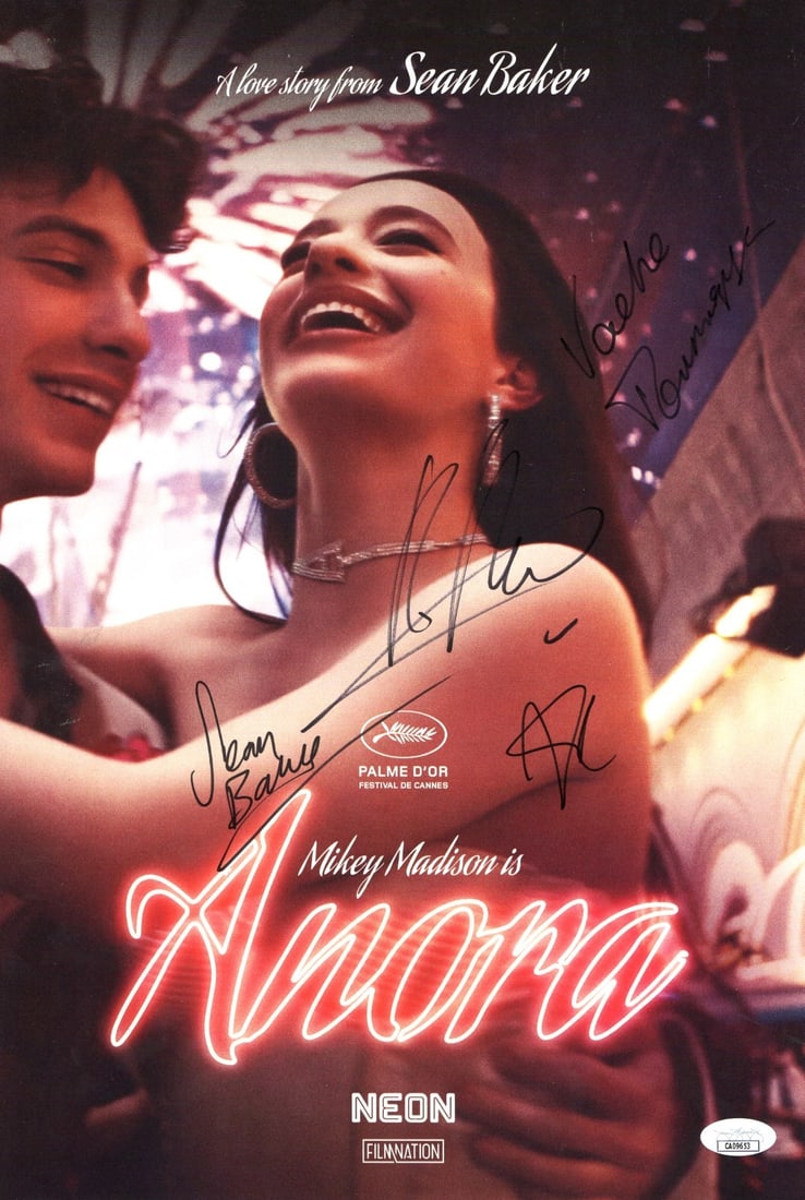Anora Cast Signed Photo 11x16 Sean Baker Mikey Madison JSA Authenticated: Anora Cast Signed Photo 11x16 Sean Baker Mikey Madison JSA Authenticated This is an original autographed photograph featuring the cast of Anora, measuring approximately 10.75 x 15.75 inches. The piece