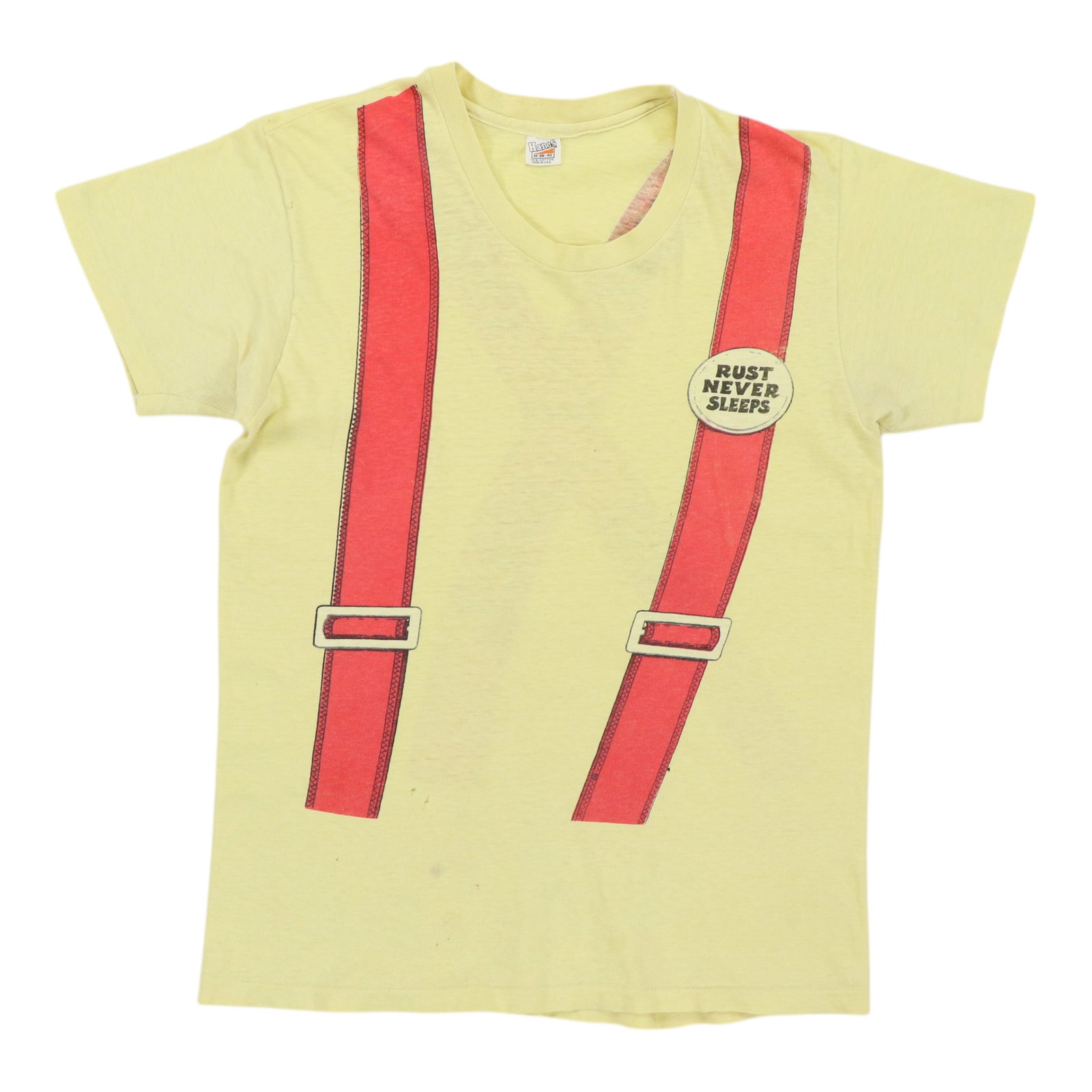 Vintage 1978 Neil Young Rust Never Sleeps Yellow Cotton Shirt: Vintage 1978 Neil Young Rust Never Sleeps Yellow Cotton Shirt This is an original vintage 1978 Neil Young Rust Never Sleeps shirt, featuring front and back graphics. The shirt is made from 100% cotton