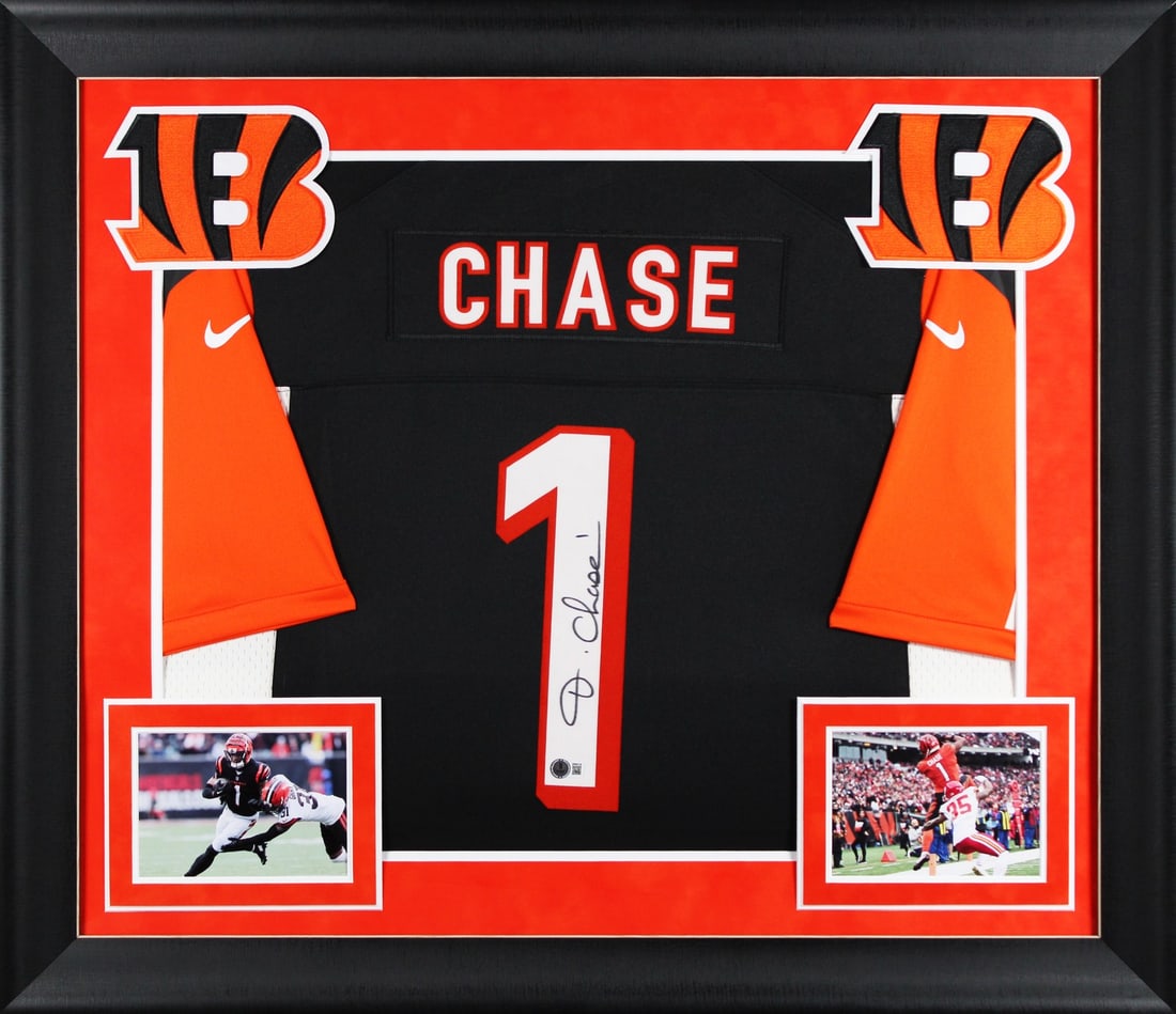 Ja'Marr Chase Signed Black Nike Limited Framed Jersey BAS Witnessed Cincinnati Bengals: Ja'Marr Chase Signed Black Nike Limited Framed Jersey BAS Witnessed Cincinnati Bengals This Black Throwback Nike Limited Framed Jersey features the autograph of Ja'Marr Chase, a standout player for th