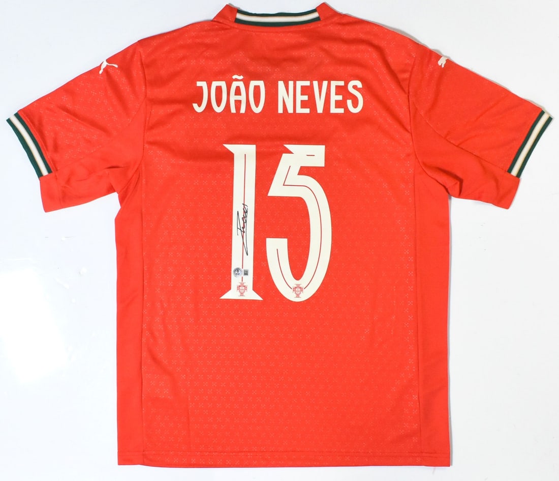 Portugal Soccer Jersey Signed by Joao Neves with Beckett Hologram: Portugal Soccer Jersey Signed by Joao Neves with Beckett Hologram This is a pre-owned Portugal home soccer jersey featuring the number 15, autographed by Joao Neves. The jersey has been authenticated 