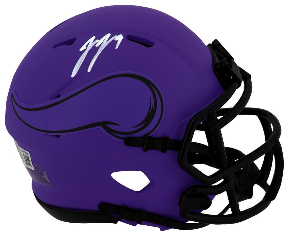 J.J. McCarthy Signed Vikings RAVE Mini Helmet with Beckett COA: J.J. McCarthy Signed Vikings RAVE Mini Helmet with Beckett COA This J.J. McCarthy signed Minnesota Vikings RAVE Riddell Speed mini helmet is a must-have for any football fan or collector. The helmet f