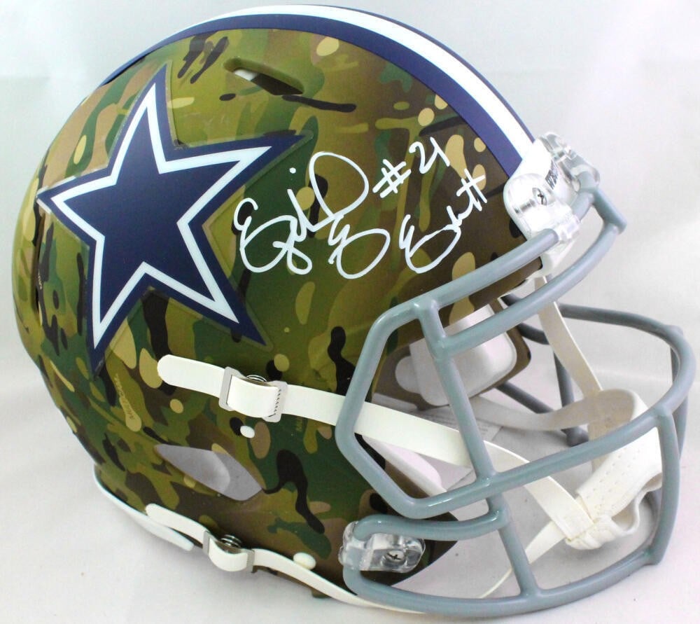 Ezekiel Elliott Autographed Dallas Cowboys Camo Full Size Helmet Beckett Authentication: Ezekiel Elliott Autographed Dallas Cowboys Camo Full Size Helmet Beckett Authentication This exceptional item features an authentic full-size helmet signed by Ezekiel Elliott, a standout player for th