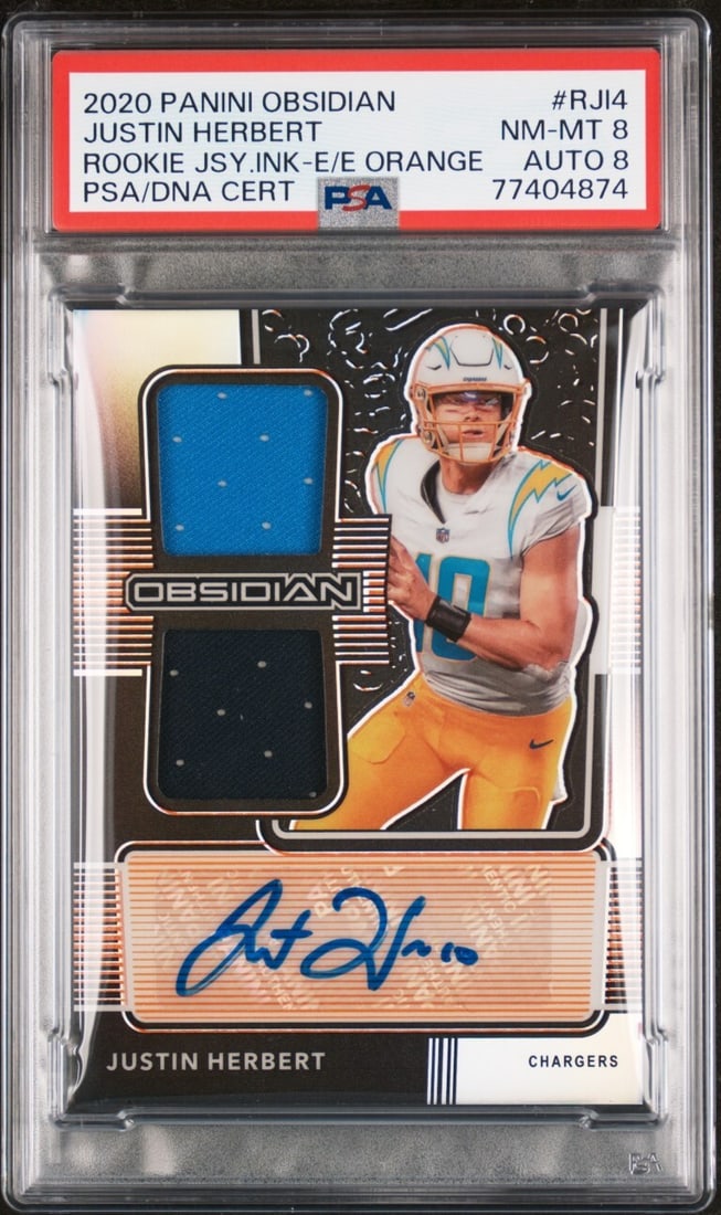 2020 Obsidian Justin Herbert Rookie Orange Jersey Auto Card PSA 8 RJI4: 2020 Obsidian Justin Herbert Rookie Orange Jersey Auto Card PSA 8 RJI4 This is a 2020 Obsidian Rookie Jersey Ink Orange Auto football card featuring Justin Herbert. The card is graded 8 by Professiona